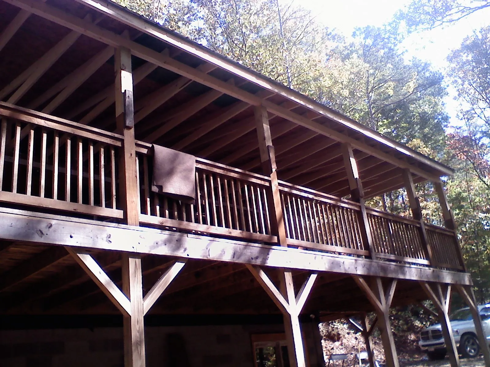 Timber framing under a new elevated porch and deck — Roof Leak Repair in New Waterford by Roofing Brothers
